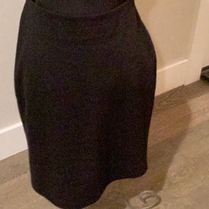 Pull on pointe knit skirt. Black ( never worn)